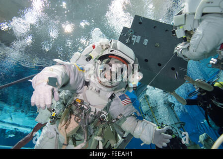 NASA astronaut Peggy Whitson during training with the EVA spacesuit in the Neutral Buoyancy Lab simulator at the Johnson Space Center January 12, 2016 in Houston, Texas. Stock Photo