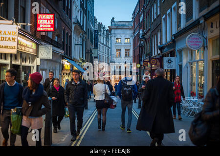 Shoppers, tourists, workers early evening in Soho, London Stock Photo