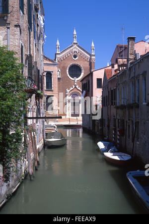 Madonna dell'Orto (madonna of the Garden) church front facade framed seen down canal Cannaregio sestier Venice Veneto Italy Stock Photo