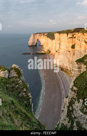 Etretat cliffs at golden hour Stock Photo