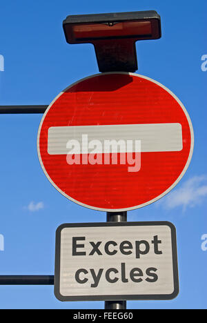 No Entry road sign with Except Cycles plate underneath Stock Photo