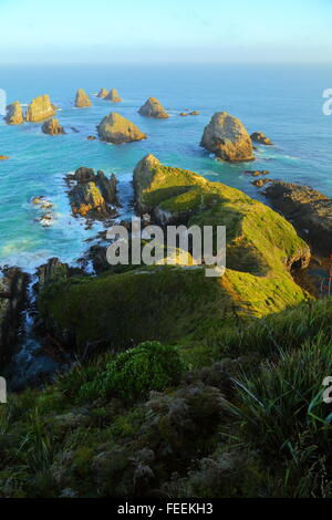 Some of the numerous 'nuggets' at Nugget Point Lighthouse on the Catlins Coast of New Zealand. Stock Photo