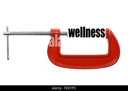 The word 'happiness' is compressed with a vice. Stock Photo