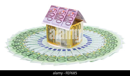 House made of euro banknotes, isolated on the white background, clipping path included. Full focus. Stock Photo