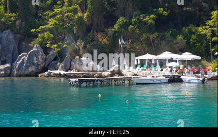 Kalami, Corfu, Ionian Islands, Greece. View across the clear turquoise waters of Agni Bay. Stock Photo