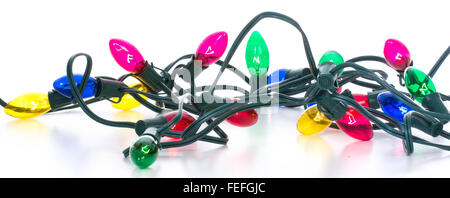 colorful tangled christmas lights on white background Stock Photo