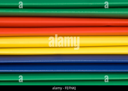 Multicolored Plastic File Folders For Background Stock Photo