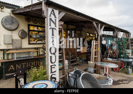 The exterior of an antiques stall at Battlesbridge Antiques Centre in Essex, UK. Stock Photo