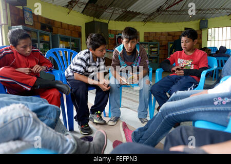 Lesestunde with children, social project, Bogota, Colombia Stock Photo