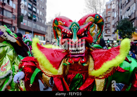 Madrid, Spain 6th February 2016. A portrait of a red masked devil from the Dominican Republic. The carnival parade in Madrid, Gran Pasacalles del Carnaval (The Grand Carnival Parade), was held in the district of Tetuán Madrid, Spain.  Credit:  Lawrence JC Baron/Alamy Live News. Stock Photo