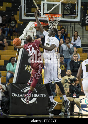 Orlando, FL, USA. 6th Feb, 2016.  t34 attempts to shoot over UCF center Tacko Fall (24) during 2nd half mens NCAA basketball game action between the Temple Owls and the UCF Knights. Temple defeated UCF 62-60 at CFE Arena in Orlando, Fl. Romeo T Guzman/CSM/Alamy Live News Stock Photo