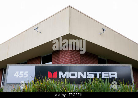 A logo sign outside of the headquarters of Monster Inc., in Brisbane, California on January 24, 2016. Stock Photo