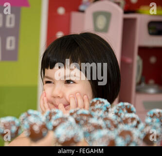 Little girl at birthday party Stock Photo