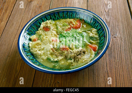 Fahsa  Yemeni stew. It is made of lamb  with lamb broth. Spices and holba, fenugreek Stock Photo