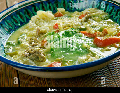 Fahsa  Yemeni stew. It is made of lamb  with lamb broth. Spices and holba, fenugreek Stock Photo