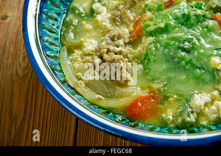 Fahsa  Yemeni stew. It is made of lamb  with lamb broth. Spices and holba, fenugreek Stock Photo