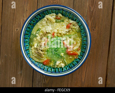 Fahsa  Yemeni stew. It is made of lamb  with lamb broth. Spices and holba, fenugreek Stock Photo