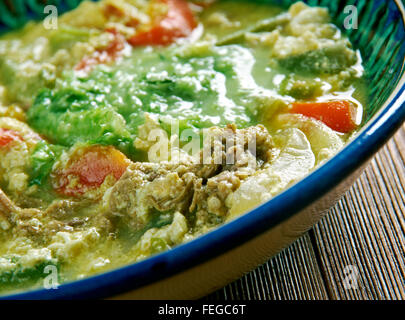 Fahsa  Yemeni stew. It is made of lamb  with lamb broth. Spices and holba, fenugreek Stock Photo