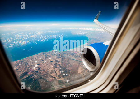 Classic image through aircraft window onto jet engine Stock Photo