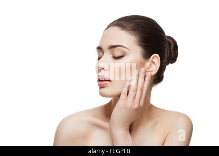 Girl with cream dots on face Stock Photo