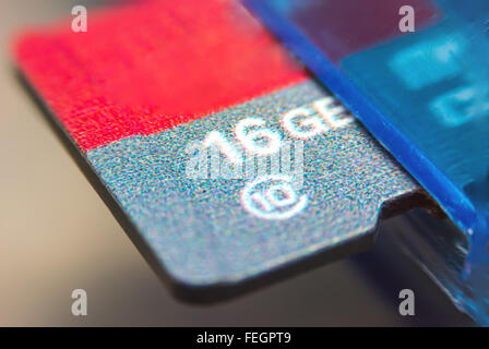 Tiny Flash-memory inserted in device Stock Photo