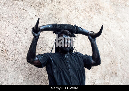 One of the participants in the carnival Devils of luzon (Guadalajara) take a stop during the festival Stock Photo