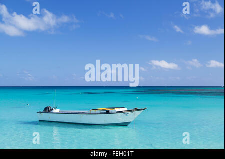 Boat on Blue Lagoon, Nacula Island, Yasawa Islands, Fiji Stock Photo