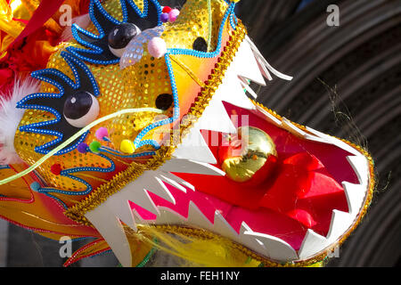 Manchester  7th February, 2016. Chinese New Year Dragon Parade.  The Year of the Monkey parade was led by a spectacular 175-foot dragon with the procession setting off from Albert Square, in front of the town hall,  making its way to Chinatown,  The parade is the traditional core of Manchester's annual Chinese New Year celebrations. Credit:  Cernan Elias/Alamy Live News Stock Photo
