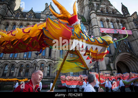 Manchester  7th February, 2016. Chinese New Year Dragon Parade.  The Year of the Monkey parade was led by a spectacular 175-foot dragon with the procession setting off from Albert Square, in front of the town hall,  making its way to Chinatown,  The parade is the traditional core of Manchester's annual Chinese New Year celebrations. Credit:  Mar Photographics/Alamy Live News Stock Photo