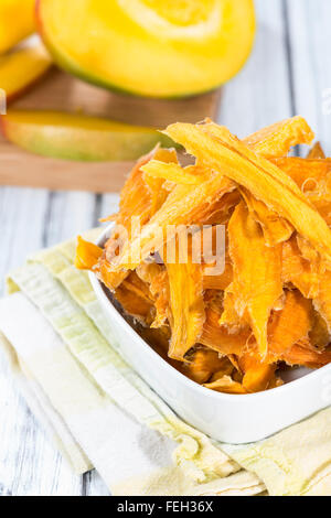 Dried Mango slices in a bowl (close-up shot) Stock Photo