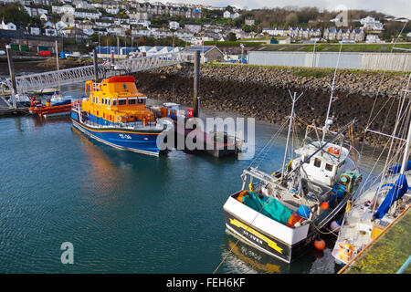 The present RNLI  Penlee lifeboat RNLB 'Ivan Ellen' on its mooring in the harbour at Newlyn, Cornwall, England, UK Stock Photo