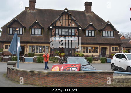 Reading, Berkshire, UK. 07th Feb, 2016. 2014 Plate BMW gets smashed by the Travellers Rest sign outside the premises believed to be caused by the high speed wind, on the Henley road in Reading. Management would not comment on the subject. Credit:  Charles Dye/Paul King/Alamy Live News Stock Photo