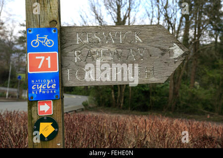 Wooden footpath sign, Keswick town, Lake District National Park, Cumbria County, England, UK Stock Photo