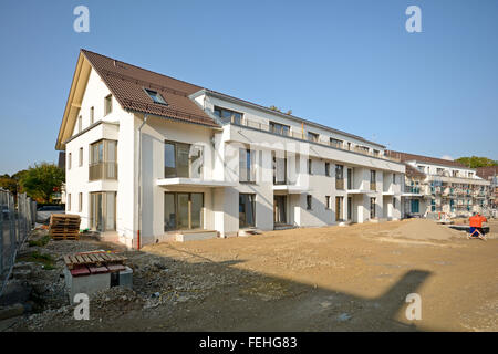 New residential buildings with outdoor facilities, construction work near completion Stock Photo