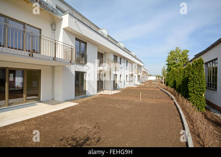 New residential buildings with outdoor facilities, construction work near completion Stock Photo