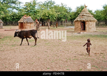 Himba village with traditional hut near Etosha National Park in Namibia, Africa Stock Photo