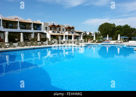 Big blue swimming-pool and terrain in high class greek hotel Aldemar Royal Mare, Crete island, Greece. Stock Photo