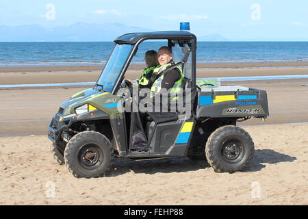 A Polaris Ranger 4x4 operated by Police Scotland, patrols the beach at the Scottish Airshow in 2015. Stock Photo