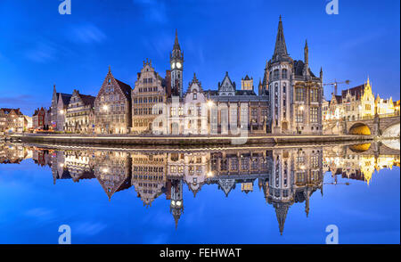 Ghent skyline reflecting in water in the evening, Flanders, Belgium Stock Photo