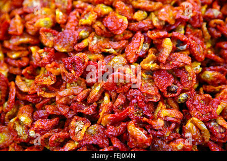 Sun dried tomatos in a market in Rome Italy Stock Photo
