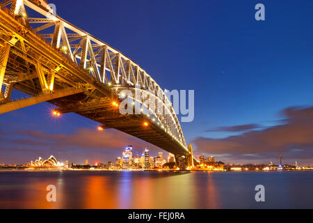 The Harbour Bridge, Sydney Opera House and Central Business District of Sydney. Photographed at night. Stock Photo