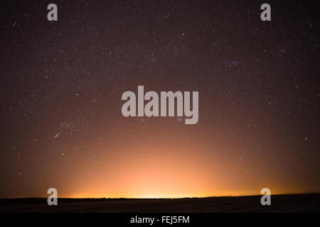 Natural Real Night Sky Stars Background Texture. Sunset, Sunrise Over Field Stock Photo