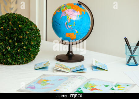school globe and books on the table Stock Photo