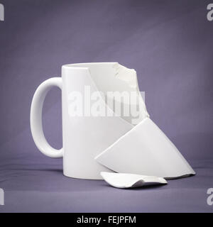 Broken ceramic cup Stock Photo