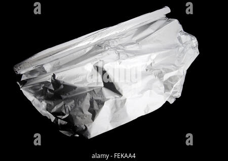 Aluminum foil  roll on black isolated background Stock Photo