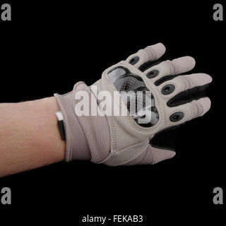 Motorcycle gloves on hand  isolated on black background Stock Photo