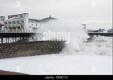 Brighton, UK. 8th February, 2016. UK Weather: Huge crashing waves battering Brighton Pier as a result of strong winds caused by Storm Imogen. The Met office has issued amber and yellow weather warnings along the south coast for strong winds and gusts of up to 70 mph. Credit:  Francesca Moore/Alamy Live News Stock Photo