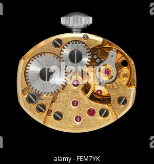 Closeup of clock works, isolated on the black  background, clipping path included. Stock Photo