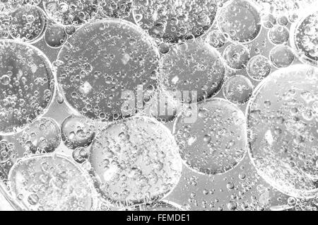 white abstract oily bubbles on water surface Stock Photo