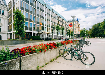 OSLO, NORWAY - JULY 31, 2014: Parked Bicycle On Sidewalk near The Ministry of Foreign Affairs of Norway Stock Photo